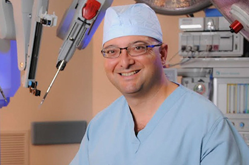 Issam A. Halaby, MD, wearing scrubs inside of an operating room